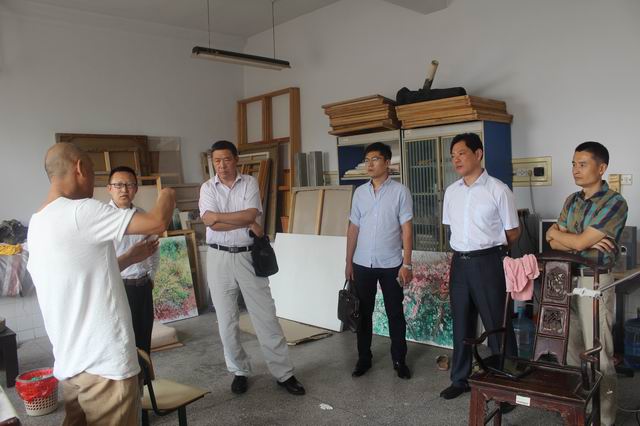 山东省美术馆副馆长、著名画家王建国一行应邀来伟德国际1946源于英国参观交流